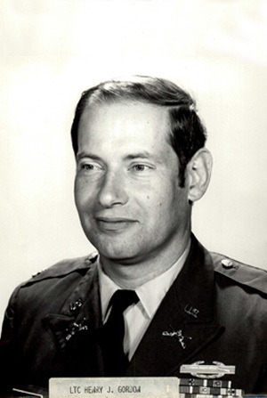 Headshot of LTC H. J. Gordon in black and white with a simple background