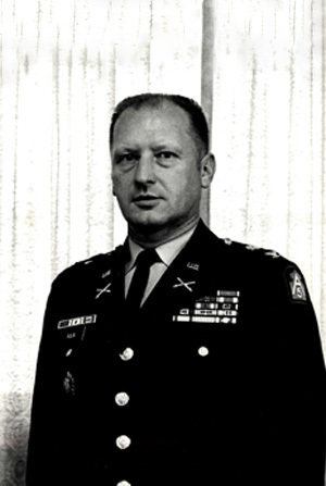 Headshot of COL F. M. Kulik Jr. in black and white with a simple background